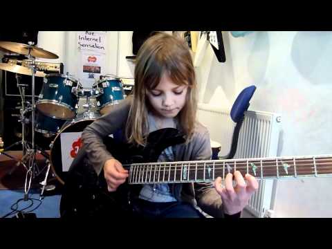 8 year old The Mini Band guitarist Zoe Thomson working on Stratosphere by Stratovarius.