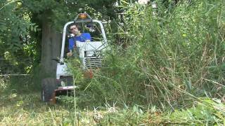 Ventrac destroys giant weeds  Extended