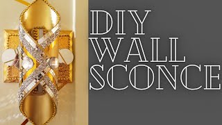 watch me make a beautiful wall sconce with dollar tree chopping mats. #glam #wallsconce