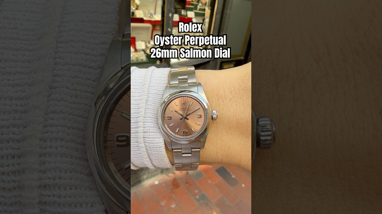 Rolex Oyster Perpetual 67180 Stainless Steel 26mm Salmon Dial Ladies Watch