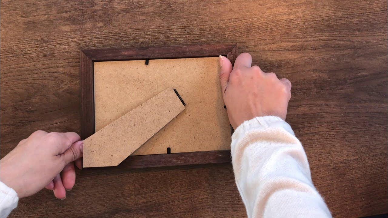 How to hang a small photo frame with KLAPiT Picture Hanging Strips