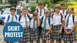 Schoolboys turn up at school in skirts to protest