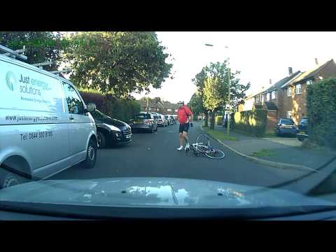 Cyclist useing mobile phone get wipped out