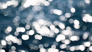 Defocused Sunlight Reflection In Water Stock Video
