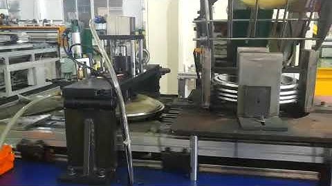 Full auto round lid curling lining machine