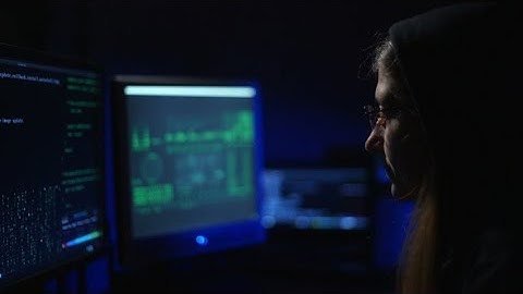 Hacker Working In Dark Room Stock Video