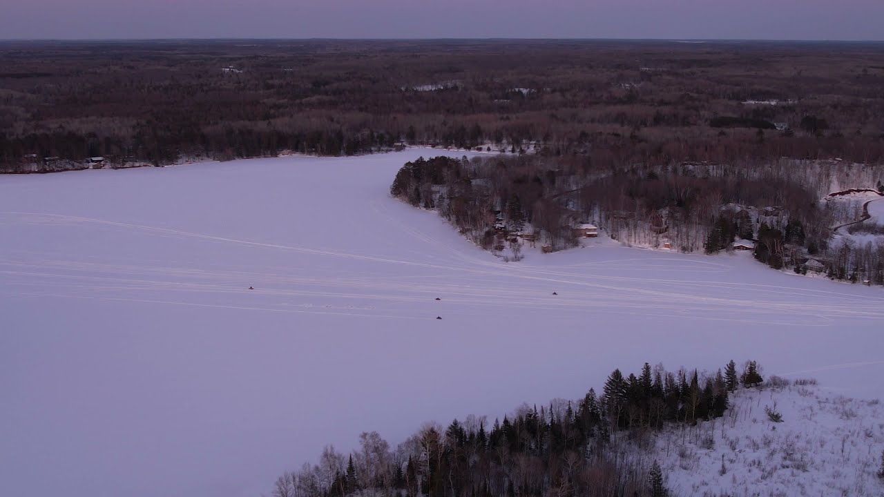 Four Snowmobiles on Lake Minnesuing YouTube