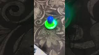 Red green spinning top
