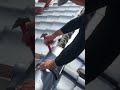 A builder who is putting roof tiles on a building