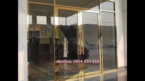 Cửa kính khung inox vàng gương