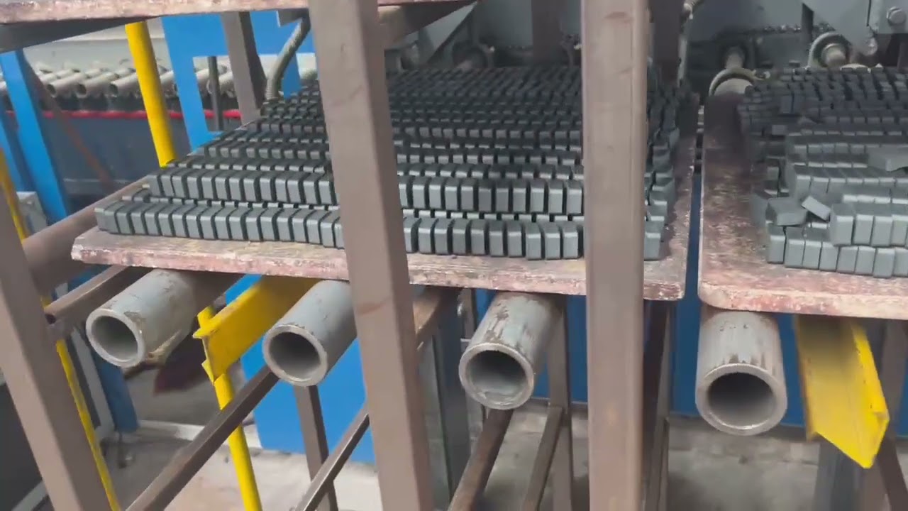 Automatic process of permanent magnet ferrite sintering