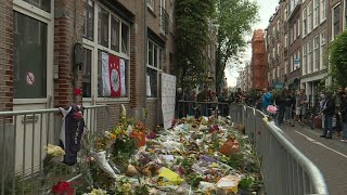 People Lay Flowers At Site Where Dutch Crime Reporter Was Shot Afp