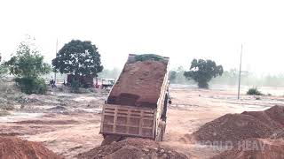 EXCAVATOR KOMATSU PC 210 WORKING WITH DUMP TRUCK