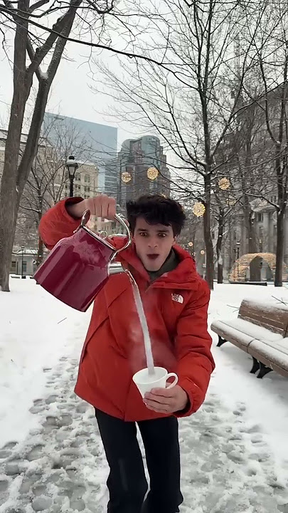 Brent Rivera pours water into a cup in Canada 🇨🇦