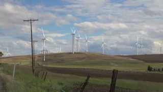 Motion HD Videos - Valley power poles turning windmills