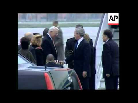 President Bush arrives in Romania ahead of NATO summit