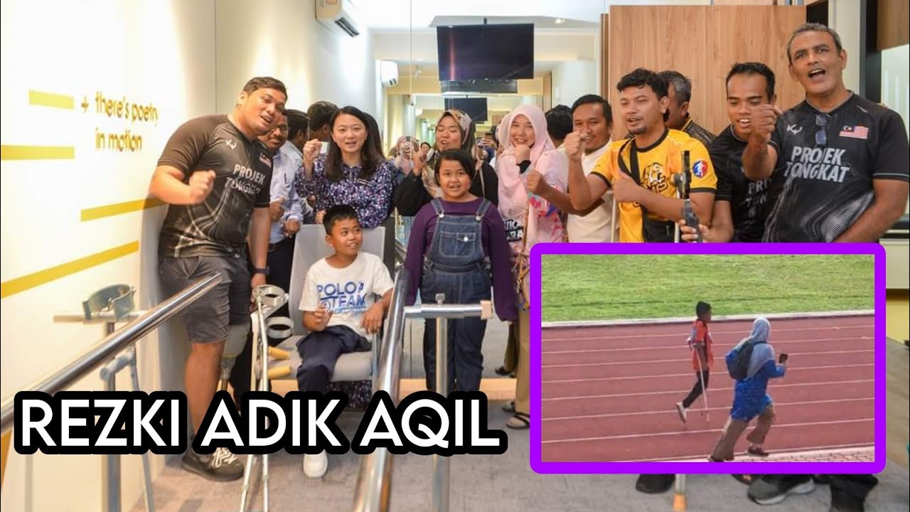 Hannah Yeoh Bantu Adik Aqil Pelajar SK Felda Lepar Utara 1 Yg Tlh Menyertai Olahraga Pendidikan Khas