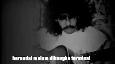 Berandal malam di bangku terminal - IWAN FALS