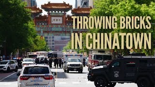 Biden lands at White House and crazy guy throws bricks off a building in Chinatown.