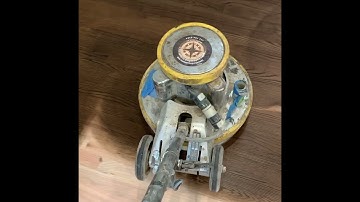 Stain application with a buffer machine. One of our main techniques for stain application.