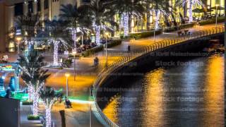Promenade in Dubai Marina timelapse at night, UAE. Top view