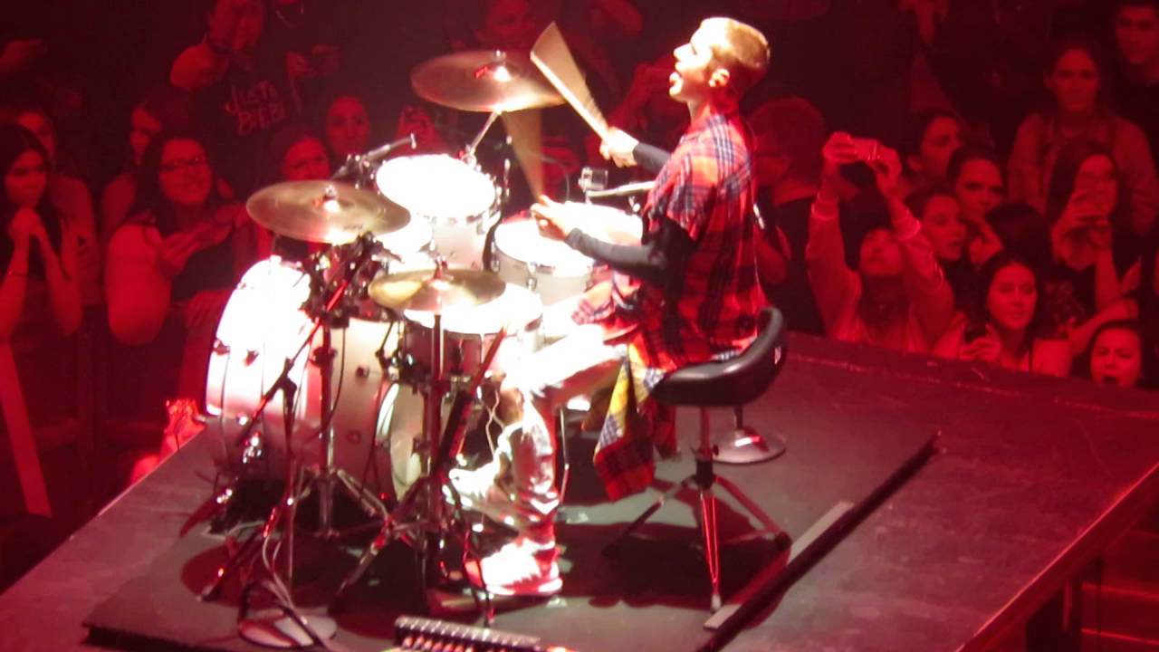 justin bieber playing the drums