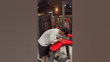 A Guy Who Does Leg Curls On The Floor Shorts 