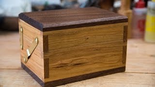 In this video I make a keepsake box for my aunt from cherry and walnut using dovetails and unique 4 bar linkage.
