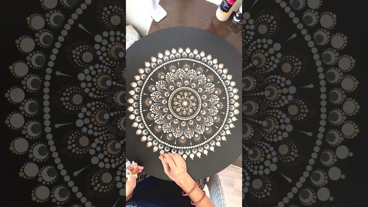 24-inch Mandala in progress. Colors used Biege, Brown, White, Golden, Light and dark gray.