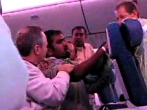 crazy-indian-man-goes-nuts-on-a-plane--funnyvideo2u.flv