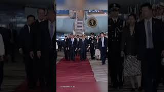 Trump Arrives in China, Greeted with Flags