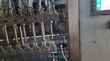 AUTOMATIC SIX HEAD LIQUID FILLING LINE SERVO DRIVEN