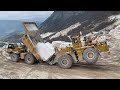 Caterpillar 992D Wheel Loader Loading Huge Marble Blocks On Caterpillar 775E Dumper - Birros Marbles