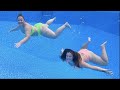 Underwater swimming with my twin sister