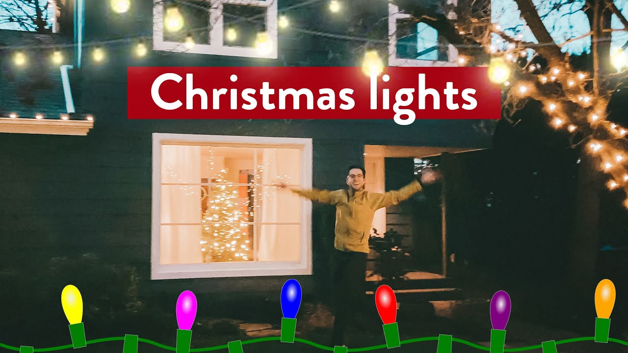 PUTTING CHRISTMAS LIGHTS UP outdoor lights on a very tall house