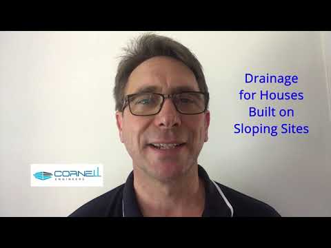 How to fix house drainage problems around homes built on sloping land. #drainage #slopingland