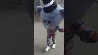 Polina dances in the head of a teddy bear