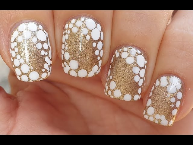 PiggieLuv: Gold glitter with pink roses nail art