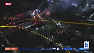 Firefighters battle blaze at high school in Compton