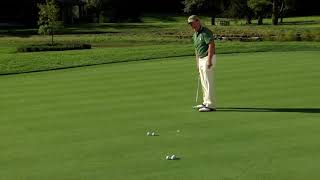 Hit your putts on your line. With Tom Watson