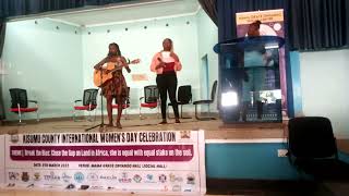 Youth performing Nakei Nairobi during women's day in Kisumu