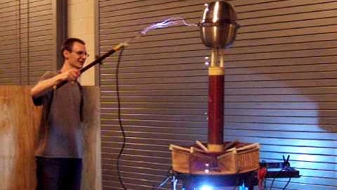 My rotary spark gap Tesla Coil with new topload