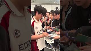 Kang Kang signing autographs after facing Paper Rex
