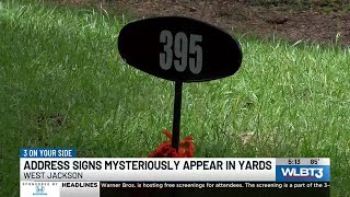 Residents question address signs that mysteriously appeared in West Jackson yards
