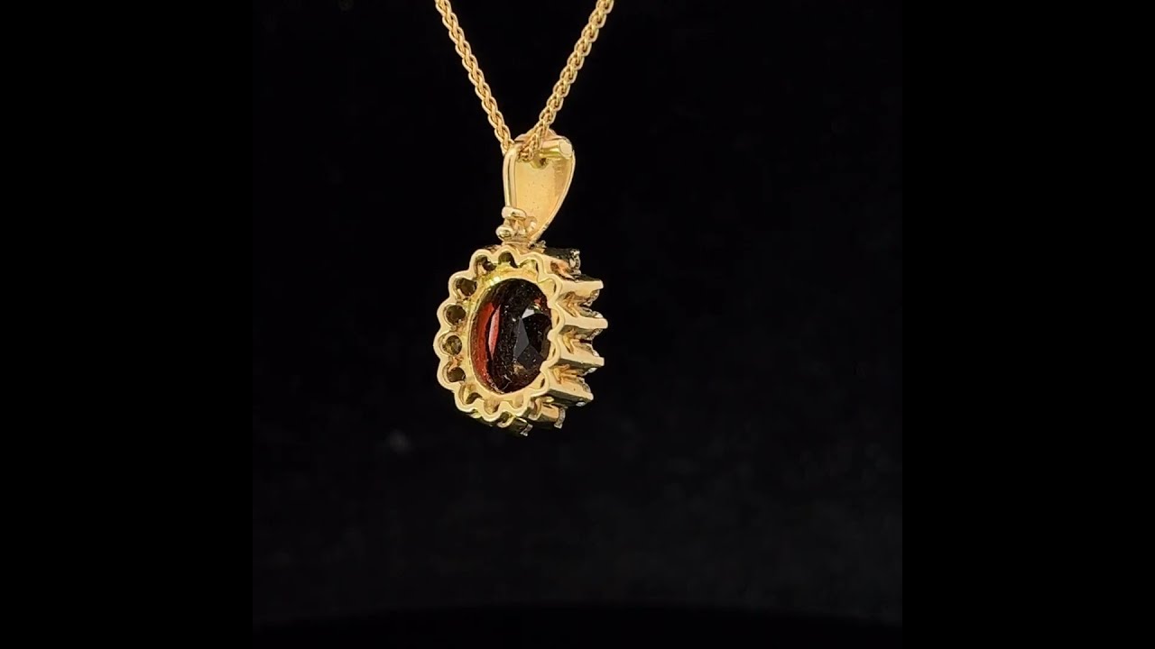 A Beautiful 18k Yellow Gold Garnet Diamond Pendant by Vintage