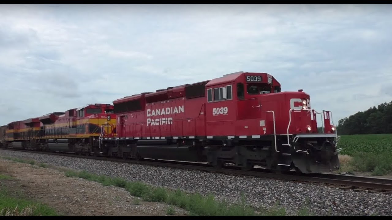 CP 5039 SD30ECO leads Canadian Paific ethanol train with help from KCS Belles