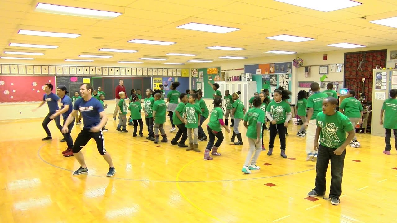 Disney's Newsies cast with students at Elm Creative Arts YouTube