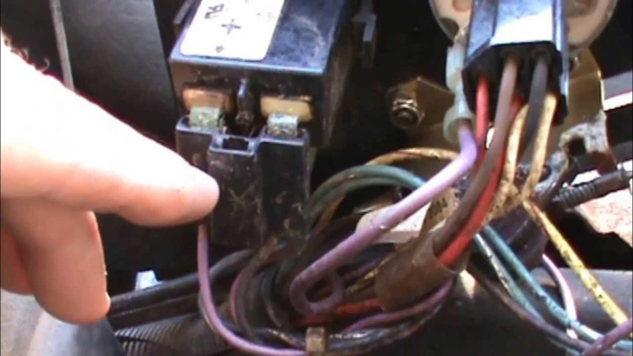 JD Z445, what fuses go here? Or rather are any of them correct. Yes that  little piece of metal was a fuse, and I have no idea how it get that way.