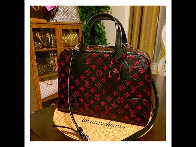 Louis Vuitton Dora Leather Handbag