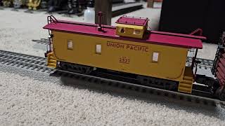 Lionel Legacy H7 pulling some cool freight